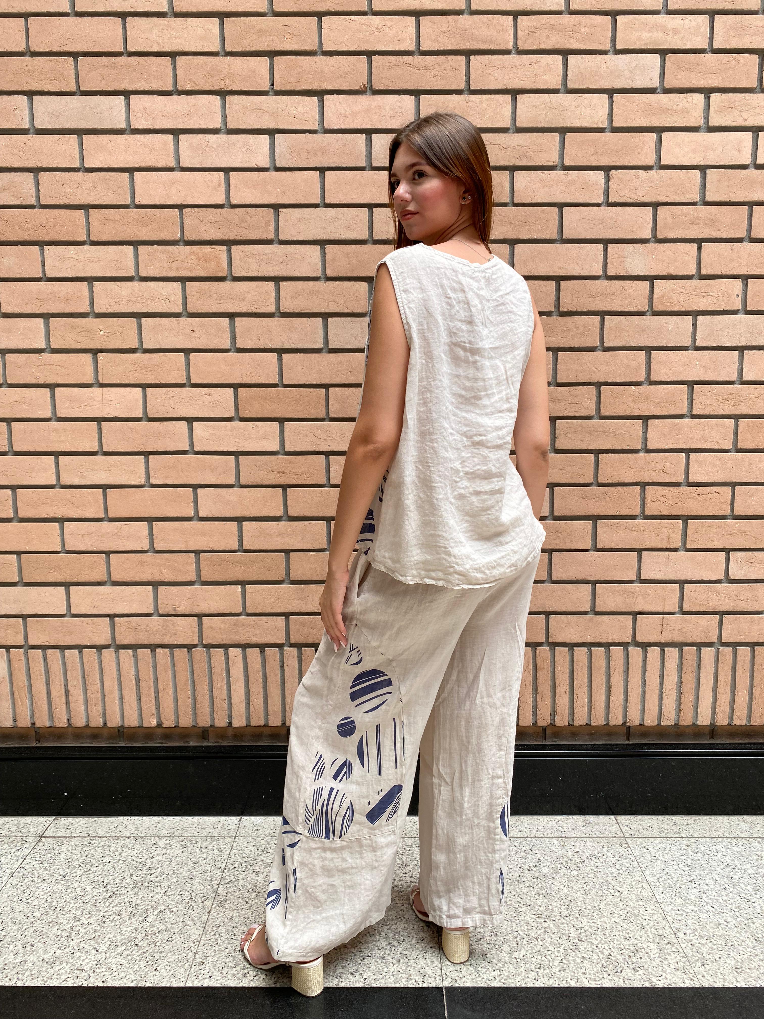Look elegante com Conjunto Positano, ideal para ocasiões refinadas e estilo atemporal.